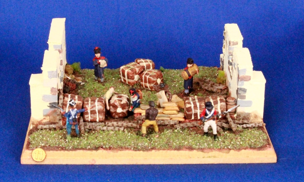 Diorama 11: parapeto de tercios de tabaco y costales de arena entre muros.